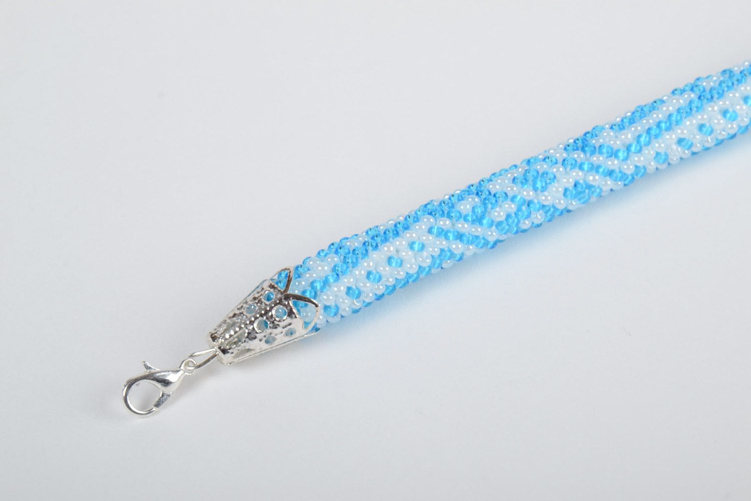 Stylish gentle handmade beaded cord bracelet of white and blue colors for women photo 3