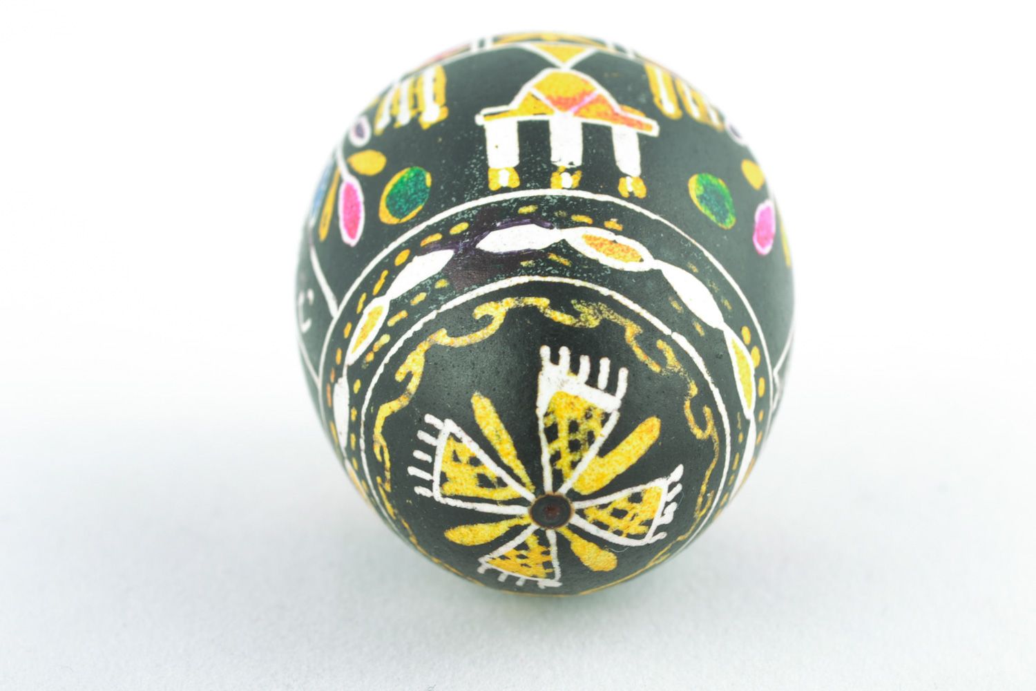 Handmade decorative egg with symbolic ornament painted using wax technique  photo 5