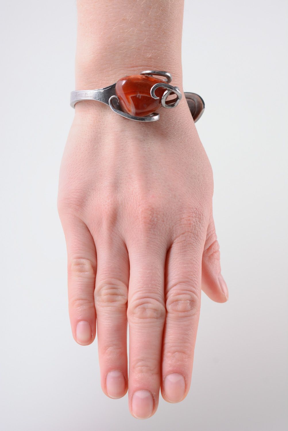 Interesting handmade metal bracelet with natural stone photo 3