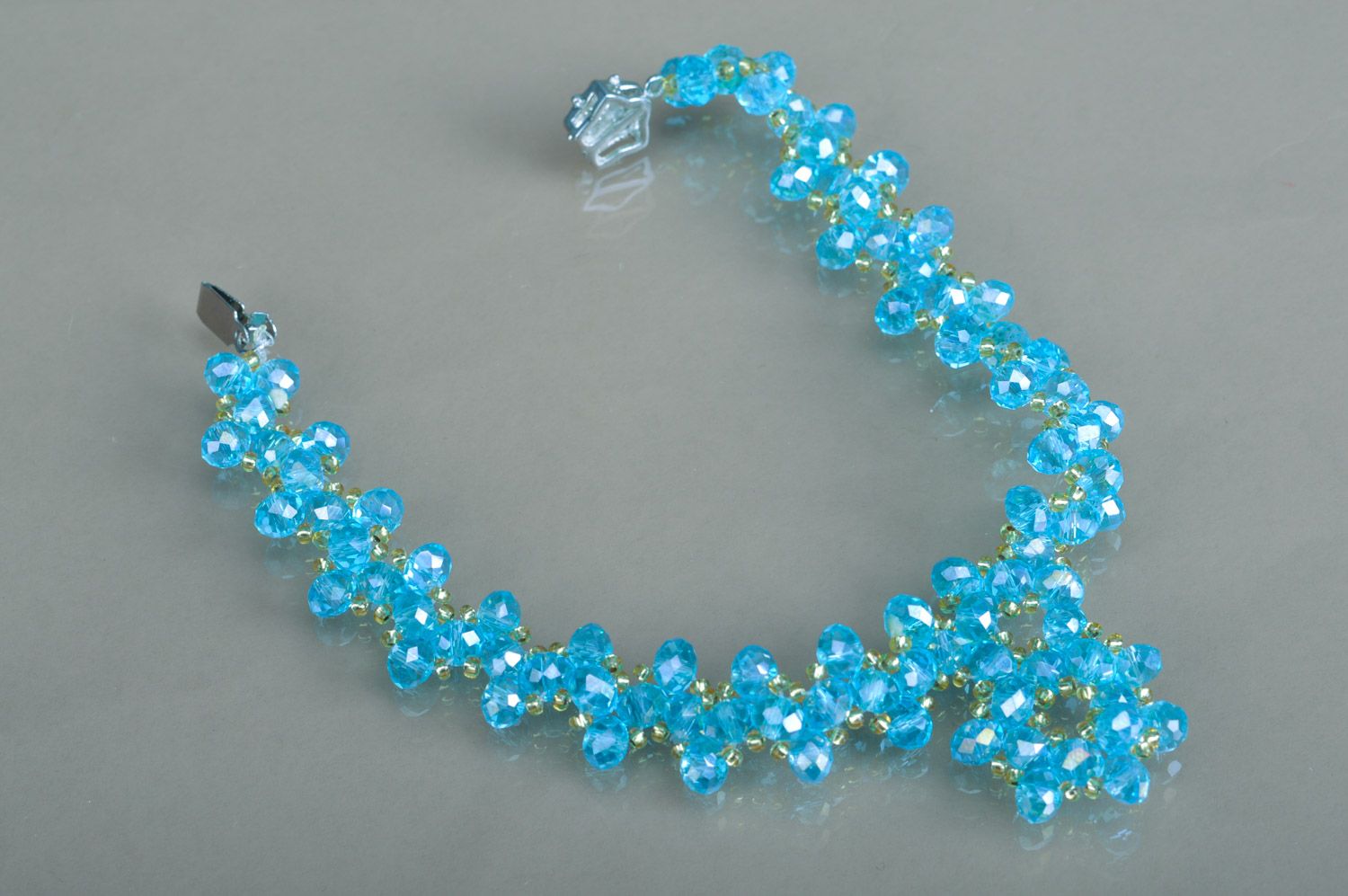 Handmade foot bracelet woven of blue crystal beads and golden seed beads photo 2