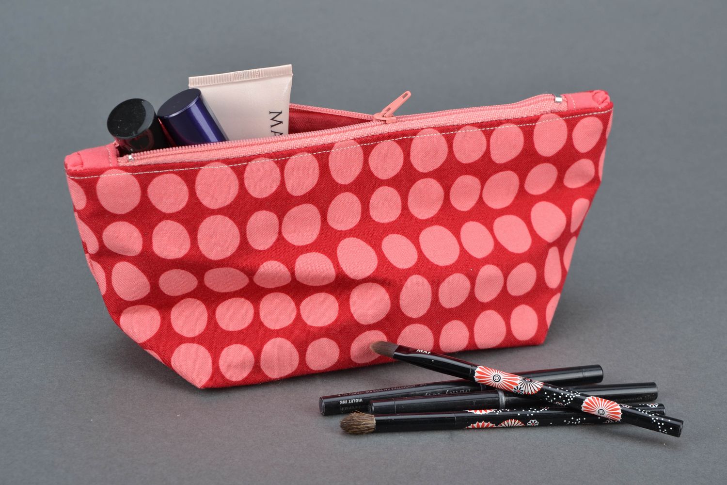Handmade cosmetic bag sewn of polka dot fabric photo 1