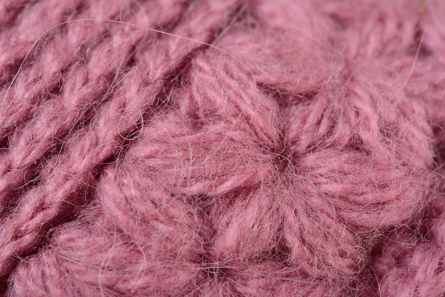 Handmade warm women's hat knitted of woolen threads of dark pink color photo 3