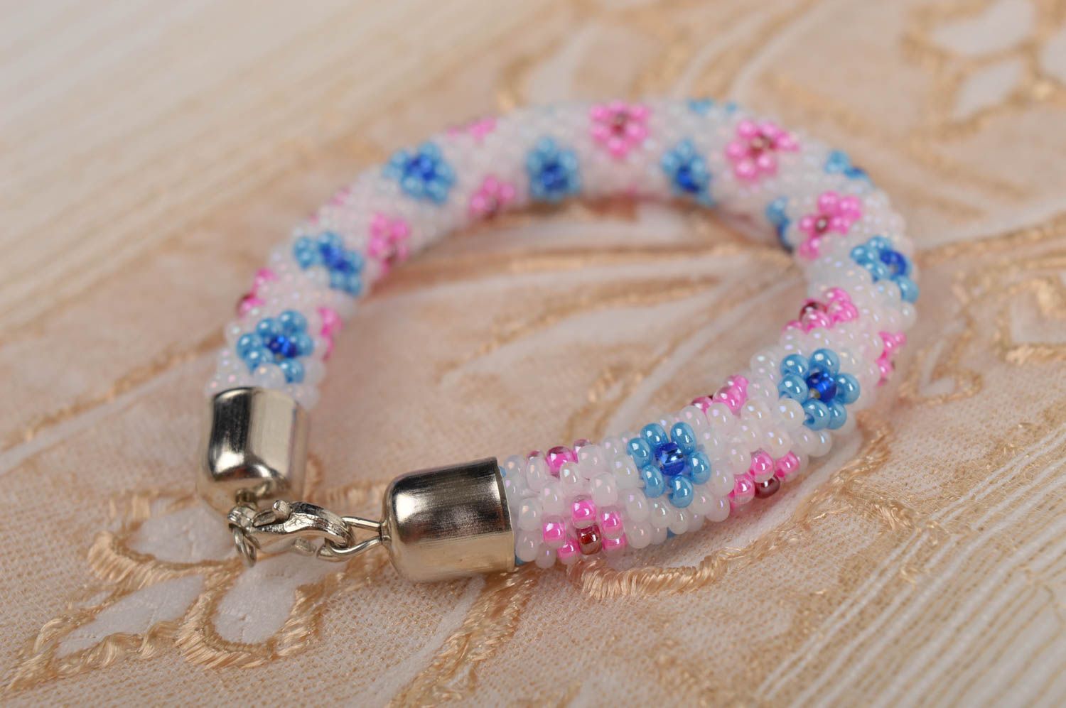 Handmade beaded bracelet cord with blue and pink flowers for girls photo 1