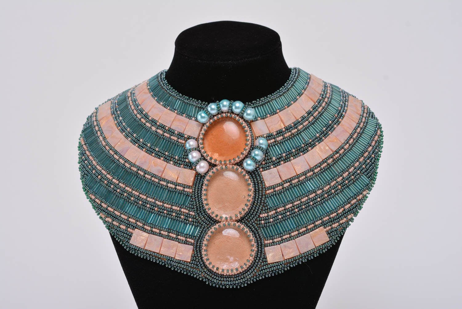 Handmade massive wide beaded necklace with decorative gems and glass cabochons photo 2