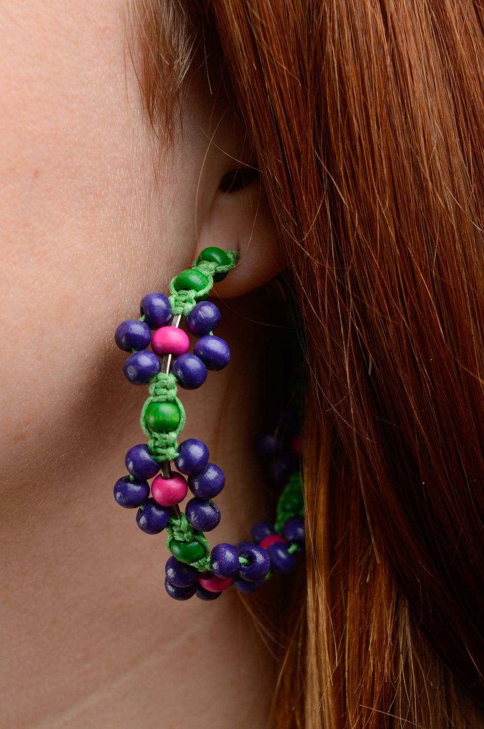 Beautiful earrings with flowers photo 3