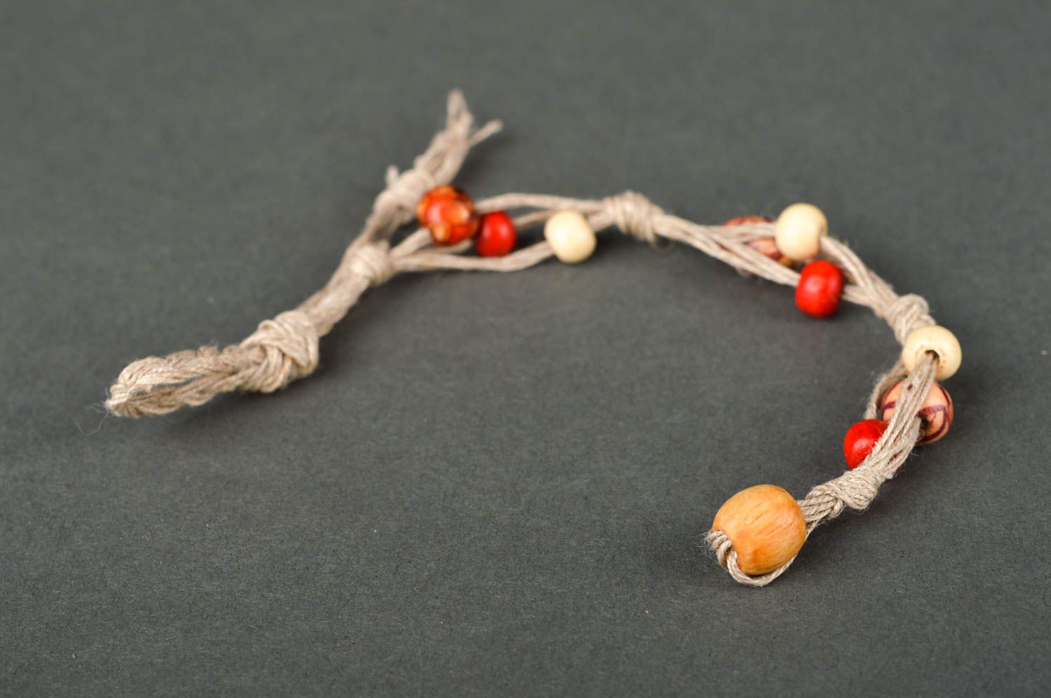 Strand rope handmade beaded bracelet with wooden red and beige beads for her photo 5