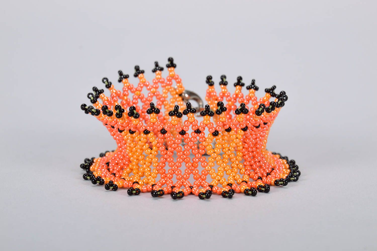 Black and orange beaded bracelet photo 3