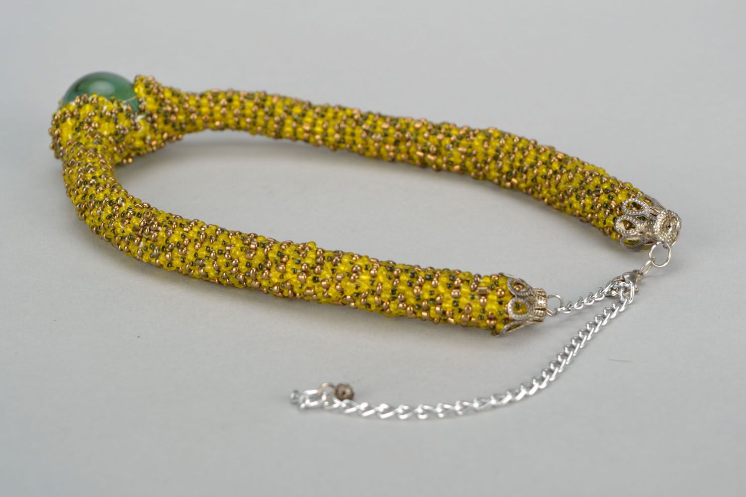 Beaded cord necklace with a glass bead photo 4