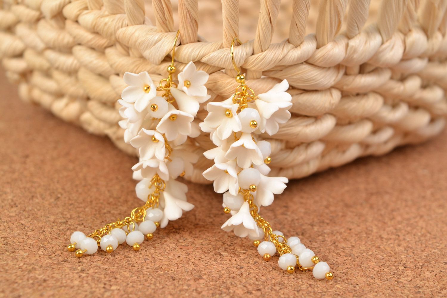 Handmade long dangling floral earrings of white color with crystal beads photo 1