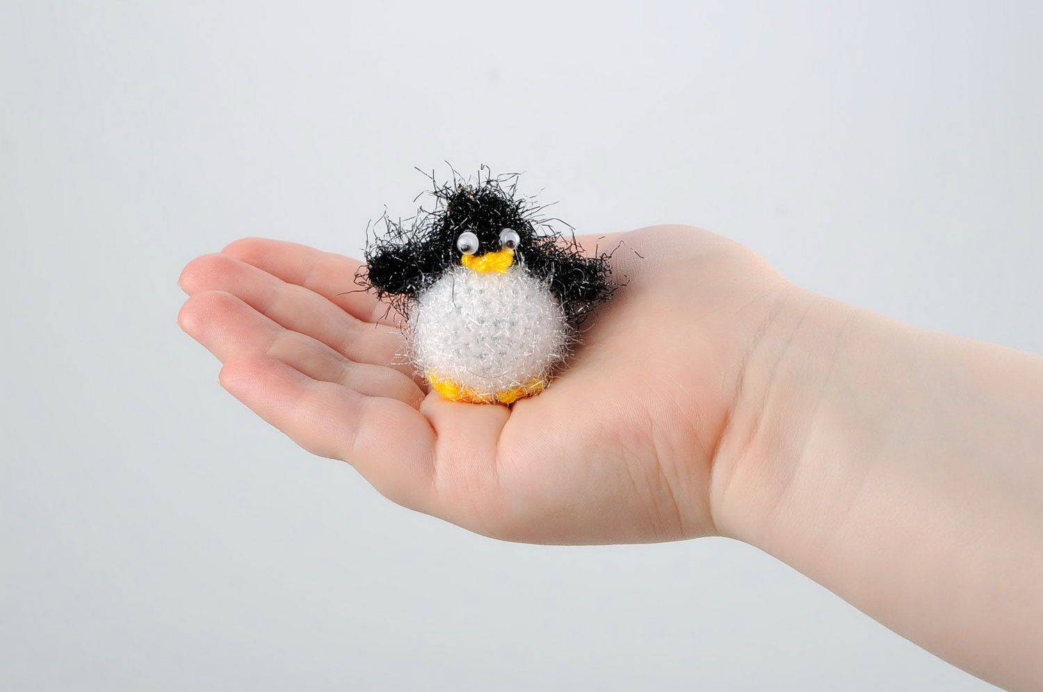 Crochet keychain with a rattle Penguin photo 3