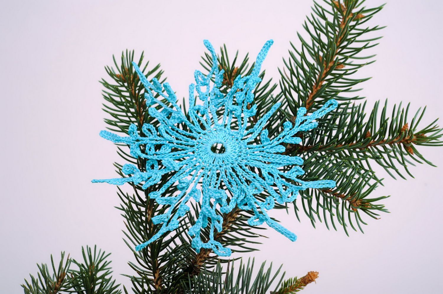 Jouet de Noël en forme de flocon de neige bleu photo 2