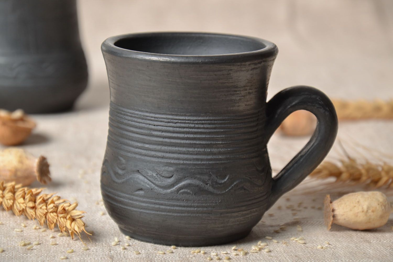Large black smoked ceramic cup for coffee or tee with handle and rustic pattern photo 1