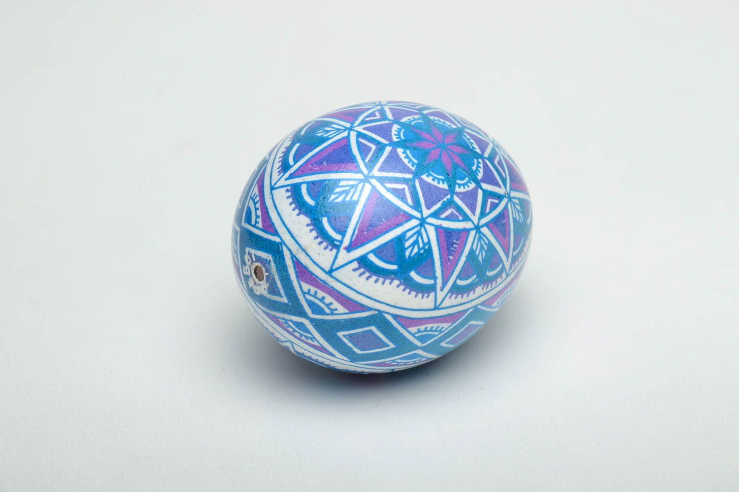 Painted chicken egg in blue color palette photo 4