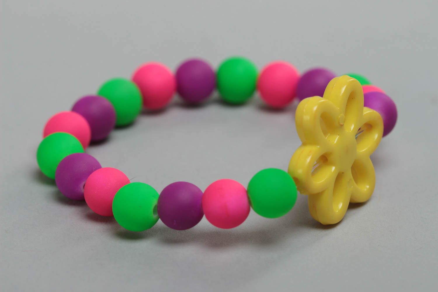 Unusual bright handmade children's plastic ball bracelet with flower photo 2