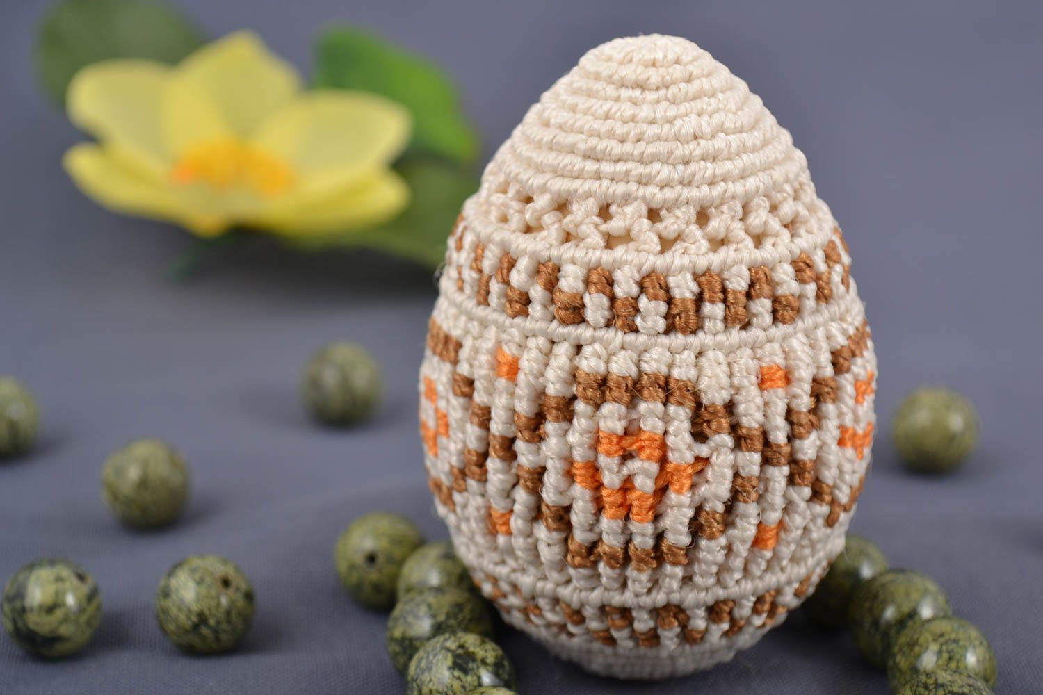 Handmade decorative macrame woven Easter egg on wooden basis beige with ornament photo 1