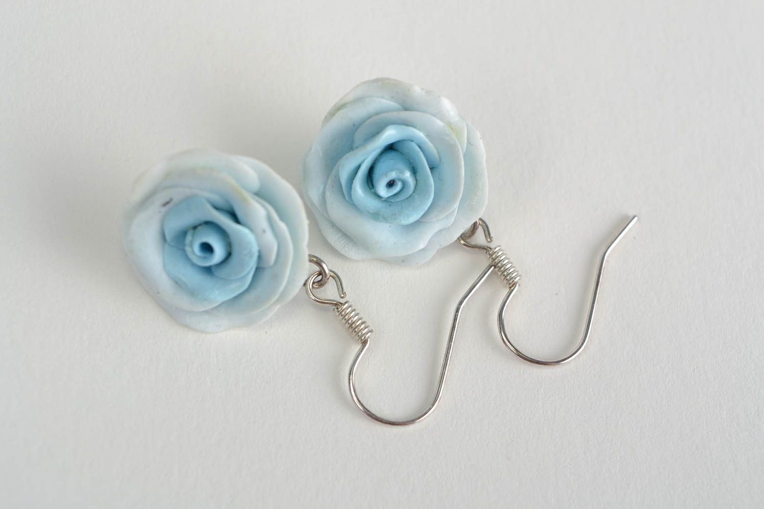 Handmade designer polymer clay earrings in the shape of tender small blue roses photo 3