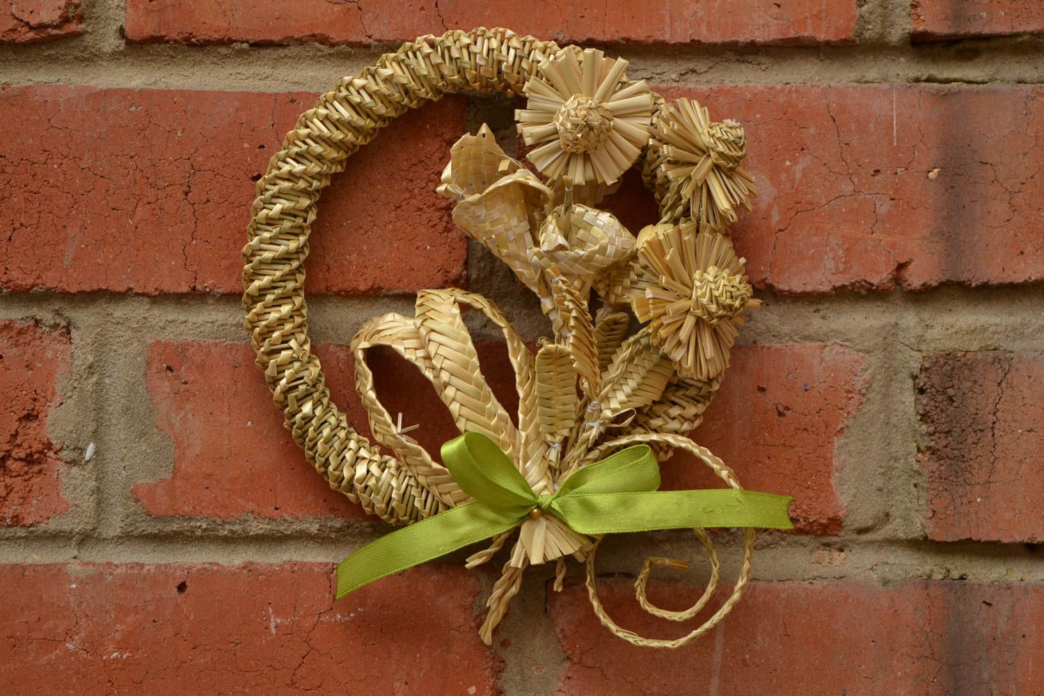 Interior beautiful woven wall pendant made of straw with flowers for home decor photo 1