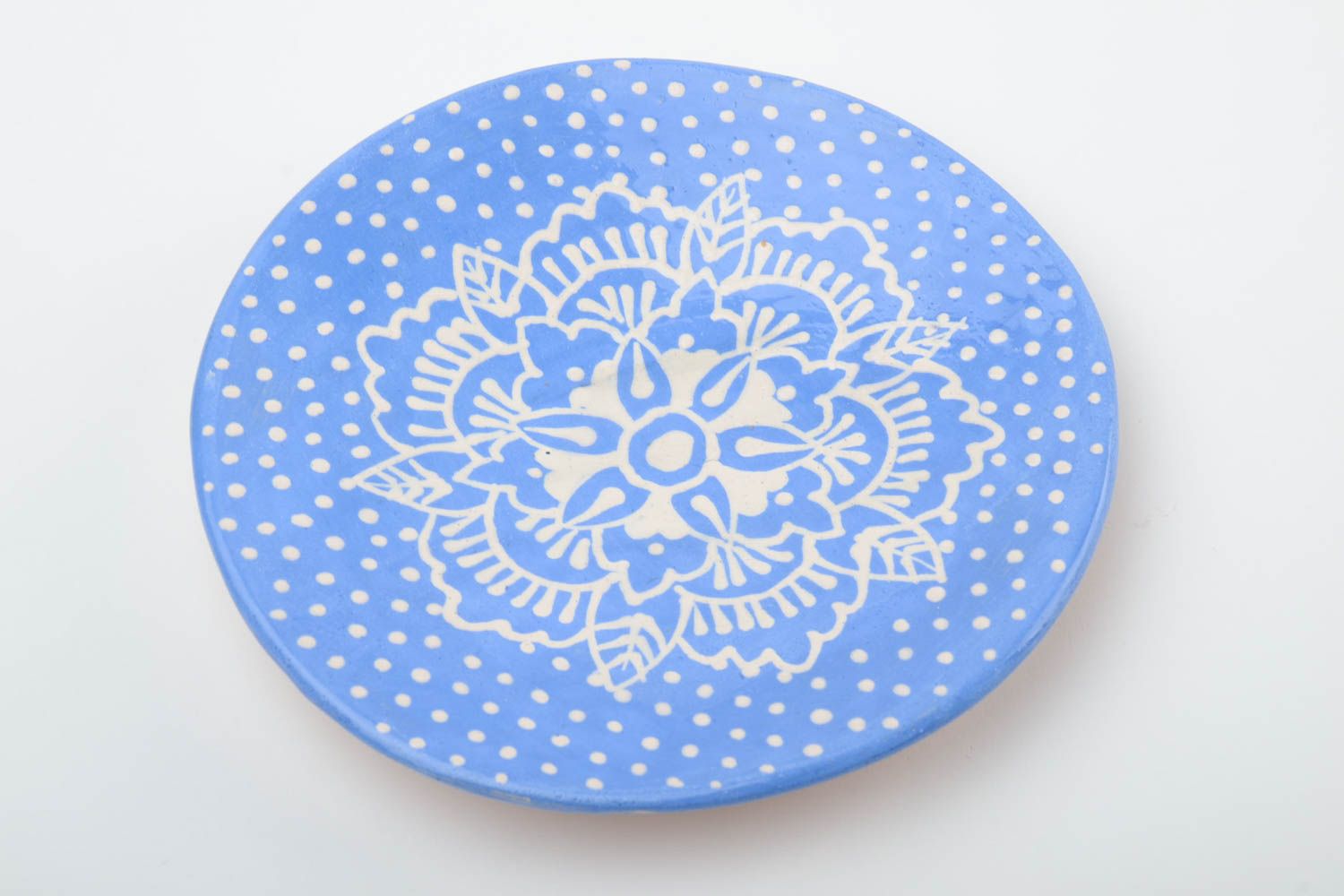 Handmade decorative small glazed ceramic saucer of blue color with white pattern photo 2