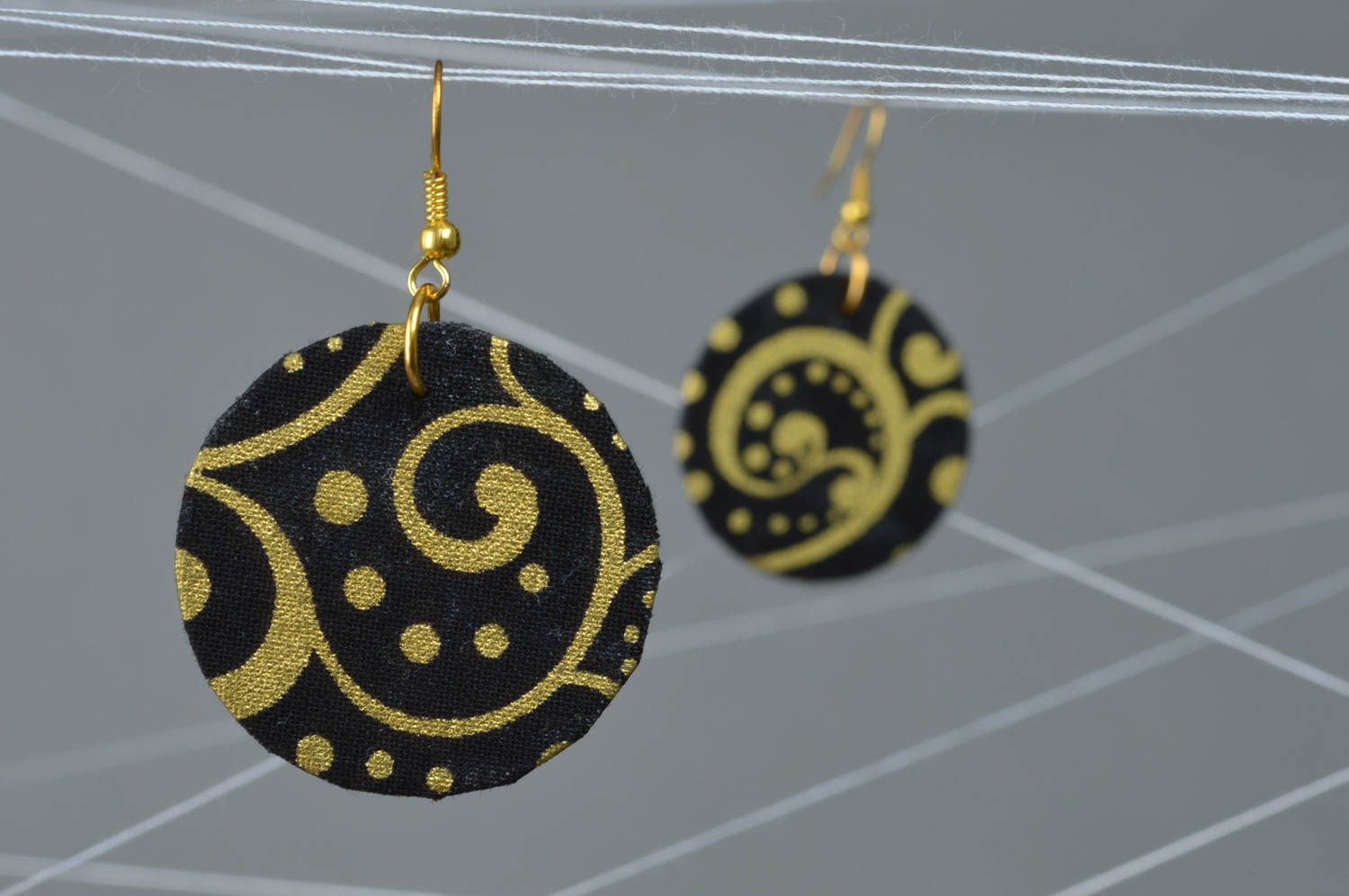 Unusual handmade designer round fabric earring of black and gold colors photo 1