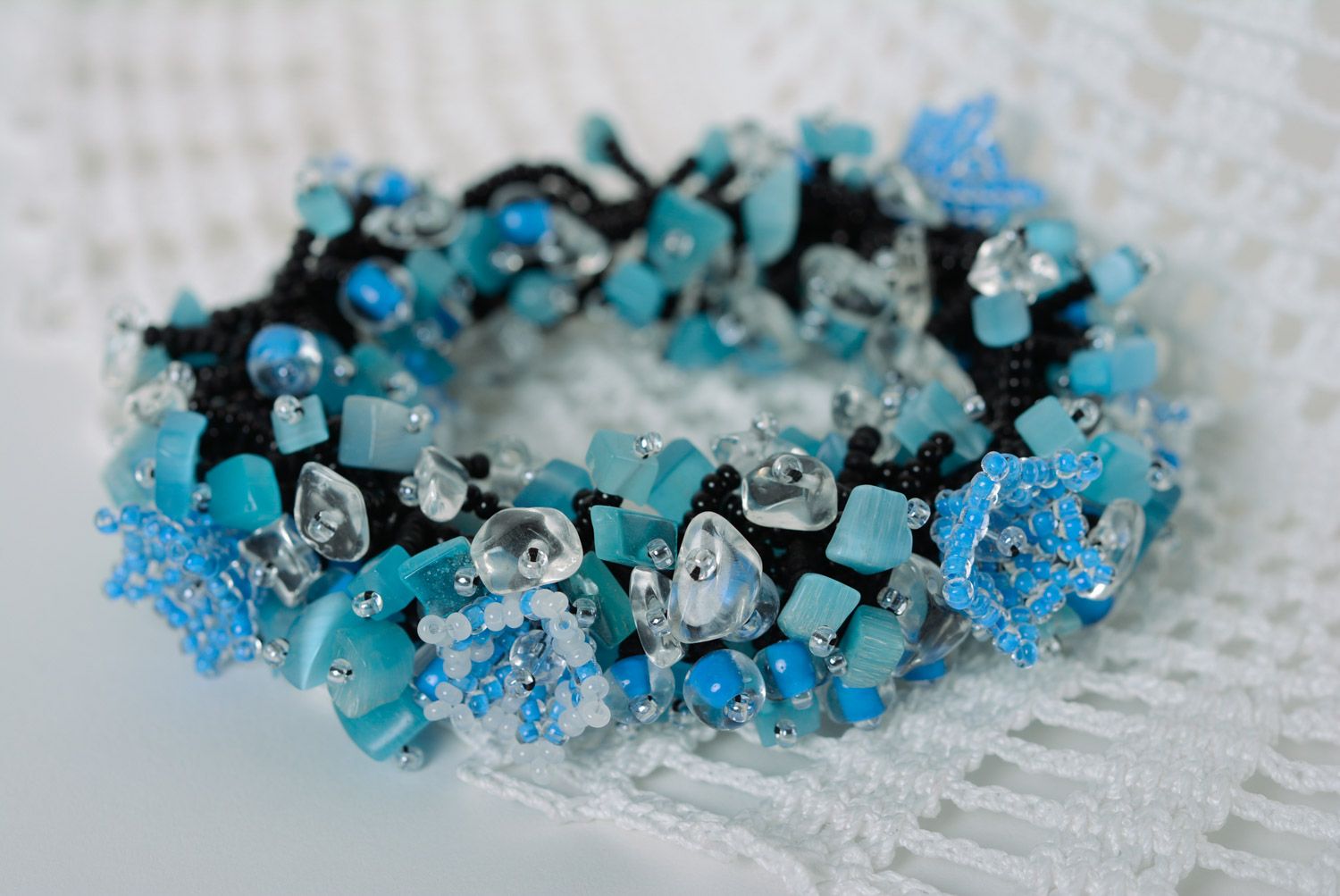 Handmade designer wrist bracelet woven of black and blue beads for women photo 1