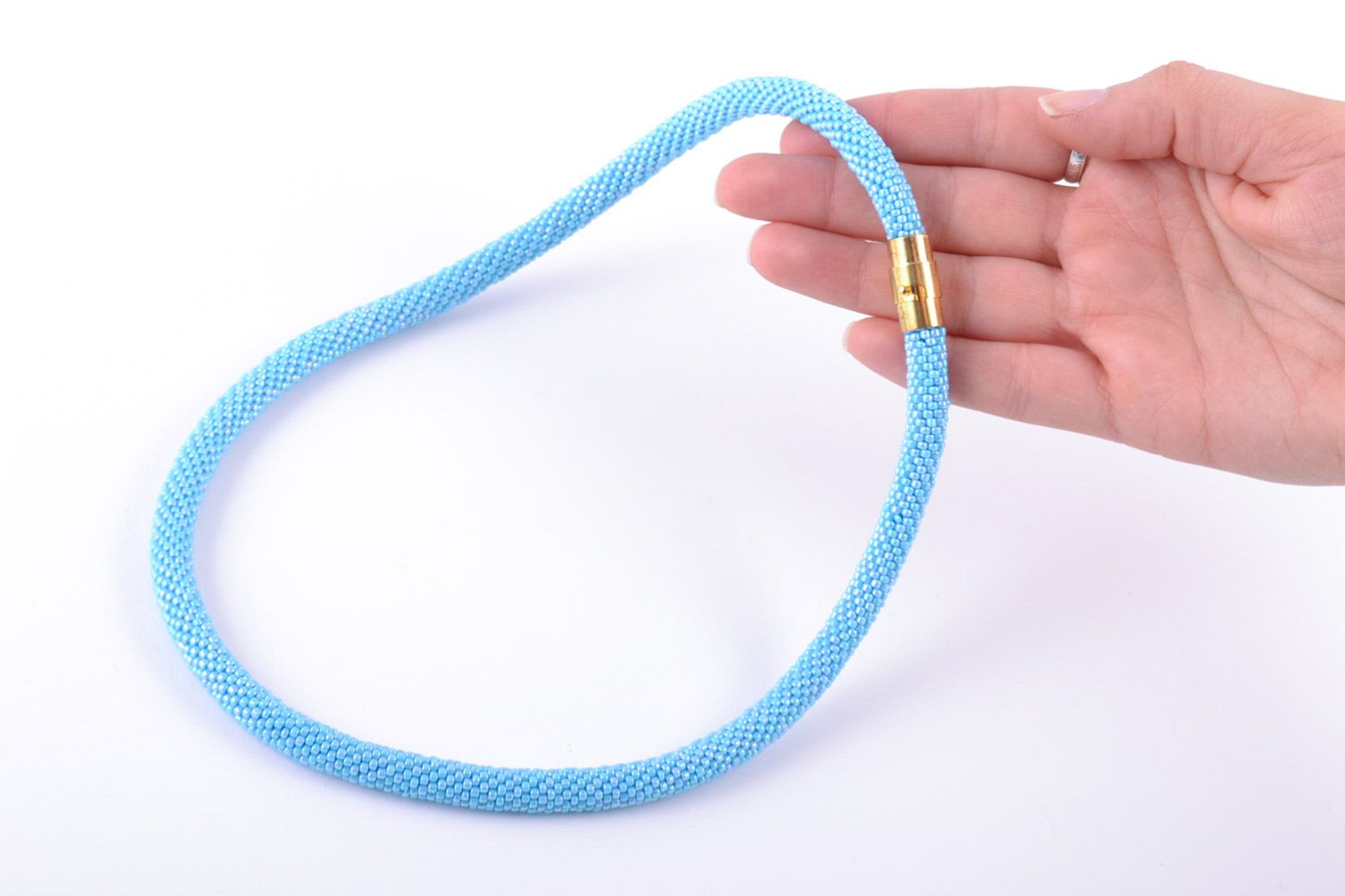 Beautiful handmade women's plain woven beaded cord necklace of blue color photo 2
