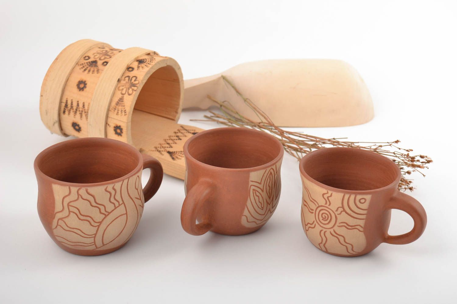 Set of three ceramic cups for coffee with cave drawings photo 1