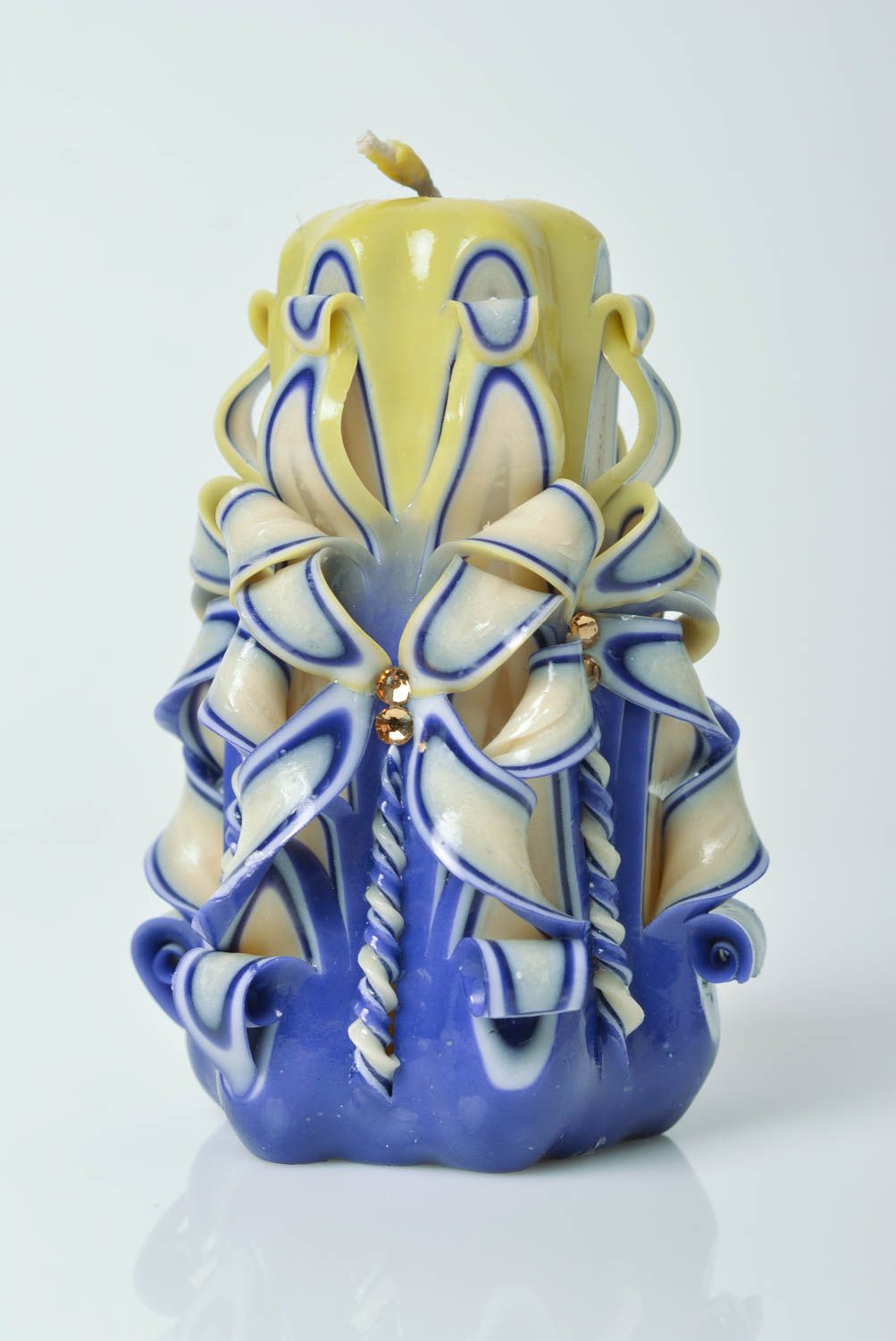 Blue and yellow handmade beautiful carved paraffin candle photo 1