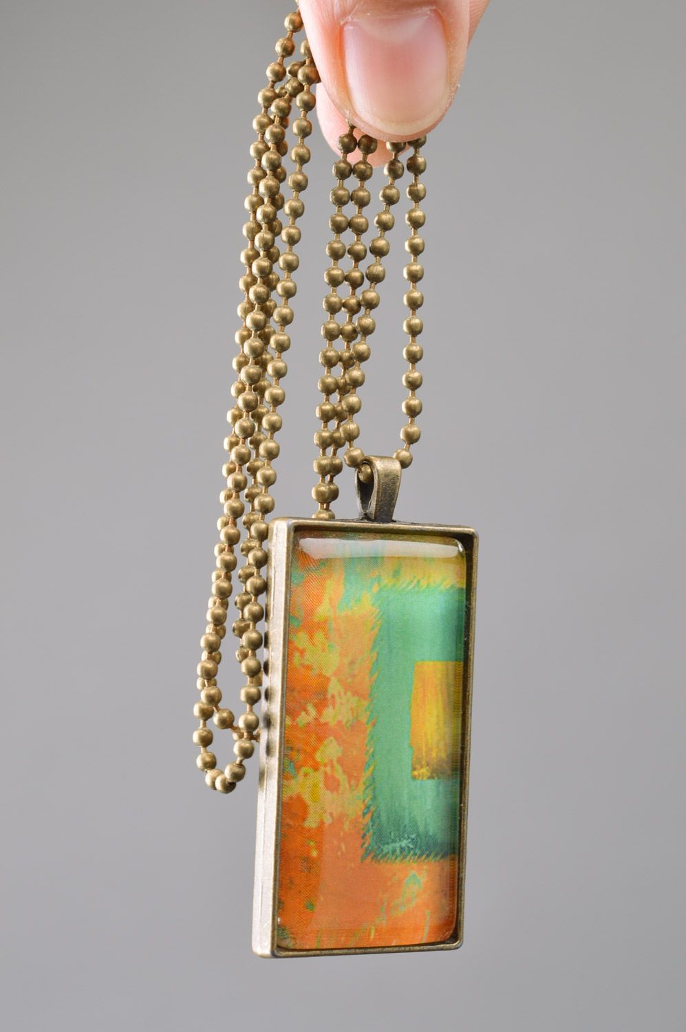 Handmade rectangular metal pendant with long chain in unusual style Picasso photo 3