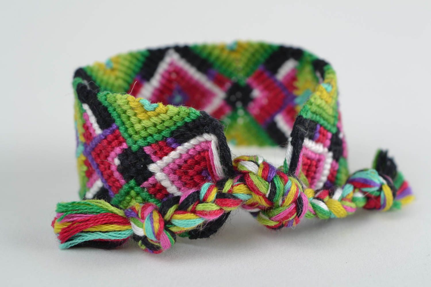 Handmade bright colorful friendship wrist bracelet woven of embroidery floss photo 4