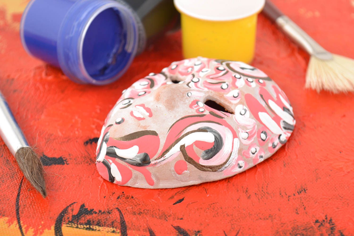Handmade pink painted wall pendant carnival mask made of clay photo 1