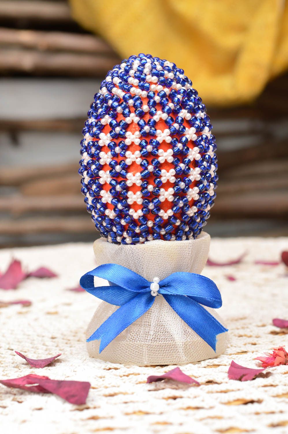 Handmade Easter egg made of papier-mache braided with beads for home decor photo 1