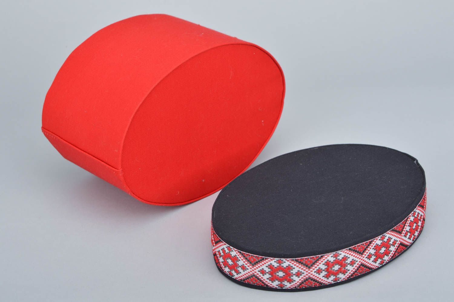 Handmade decorative oval carton box covered with red fabric with ethnic motifs photo 5