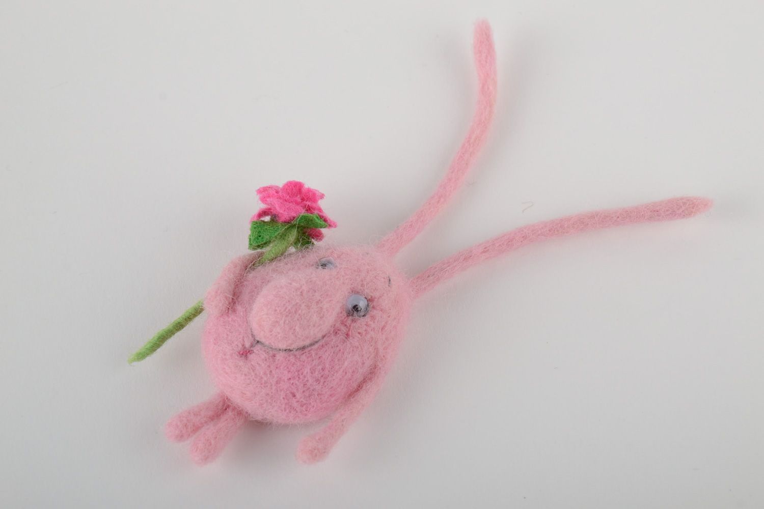Handmade fridge magnet felted of natural wool touching pink creature with flower photo 2