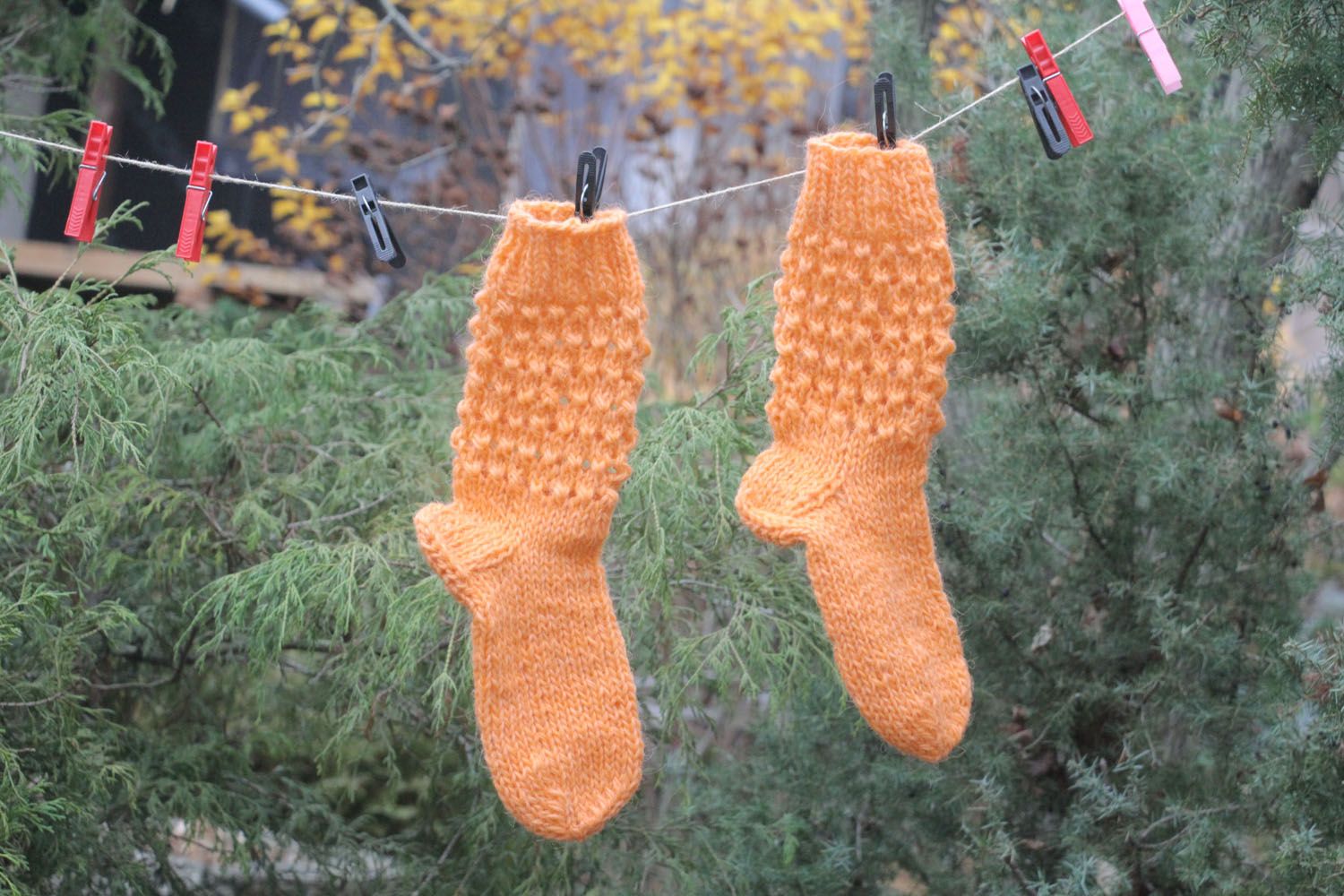 Orange knitted socks photo 1