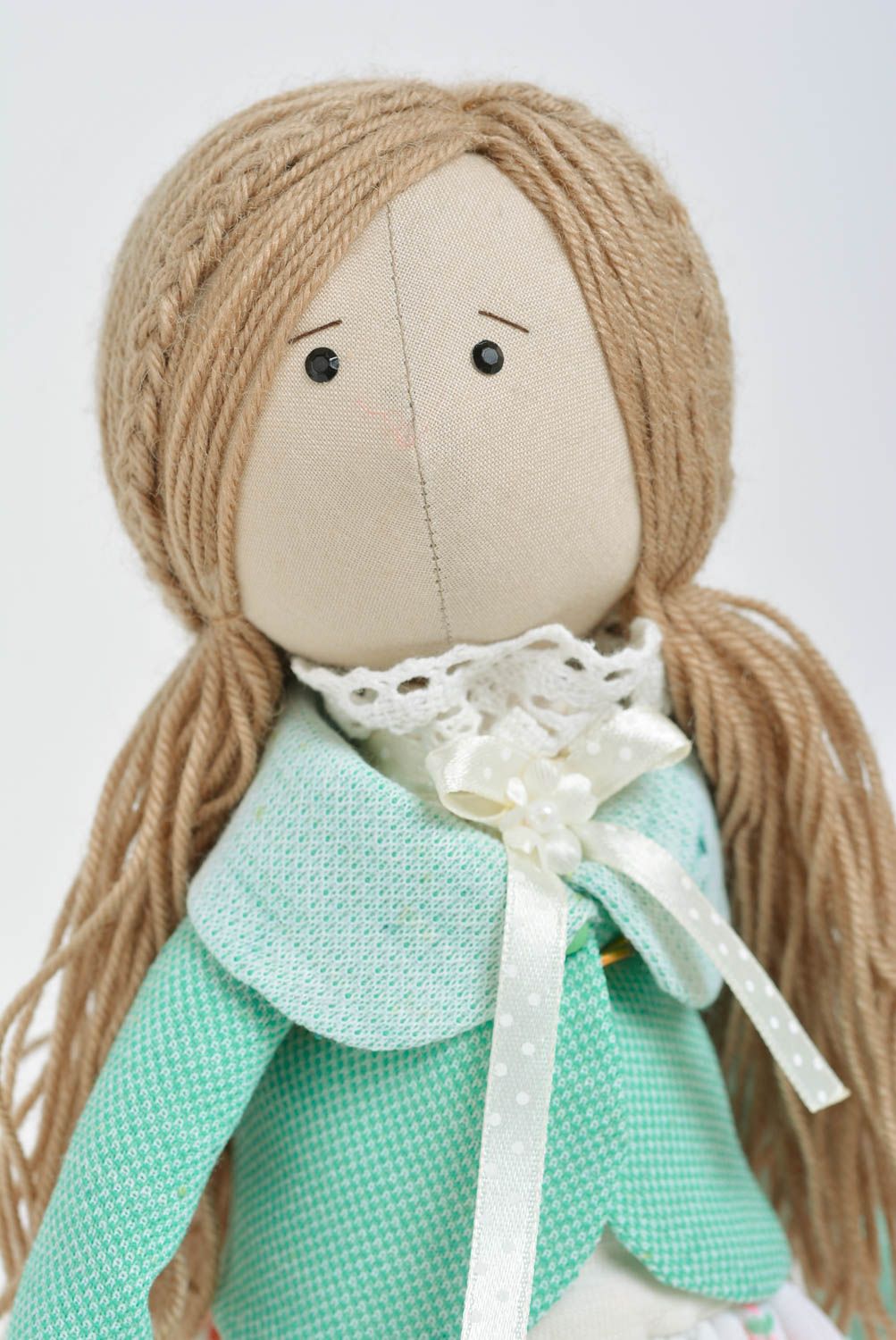 Handmade designer fabric soft doll girl in mint jacket with little soft toy photo 2