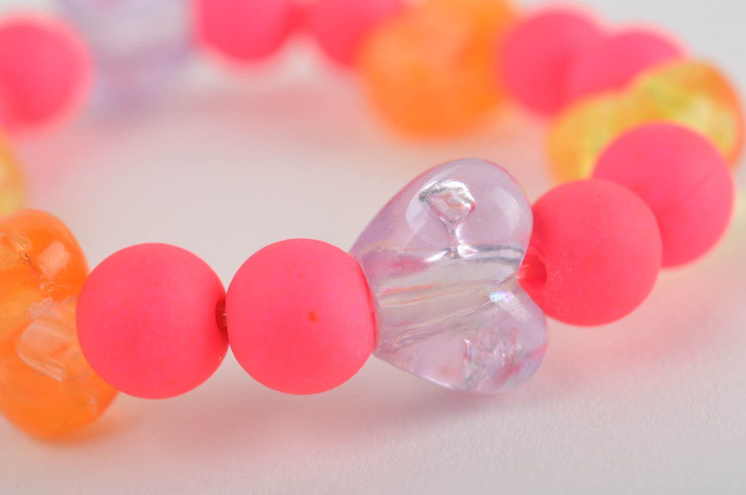 Pink kids beaded bracelet on elastic string with yellow heart-shaped bead photo 4