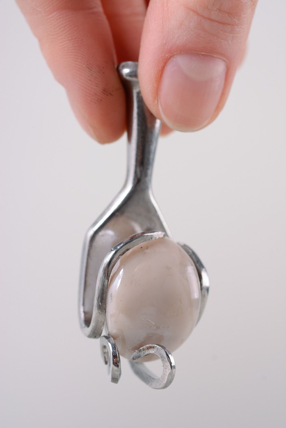 Homemade metal pendant made of cupronickel fork photo 3