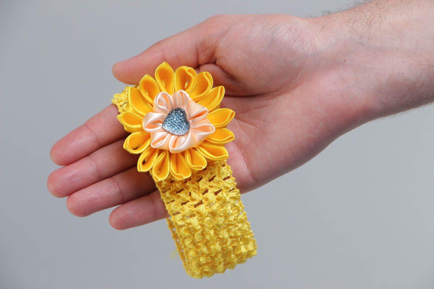 Handmade yellow headband with elastic lacy basis and satin ribbon flower photo 5