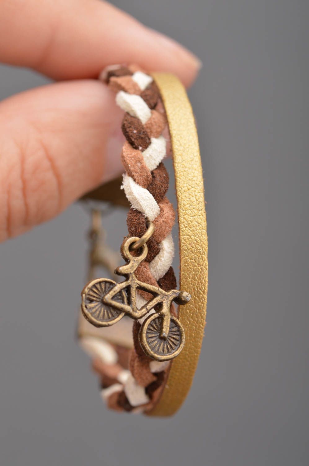 Handmade leather wrist bracelet with suede cord and metal charm Bicycle photo 2