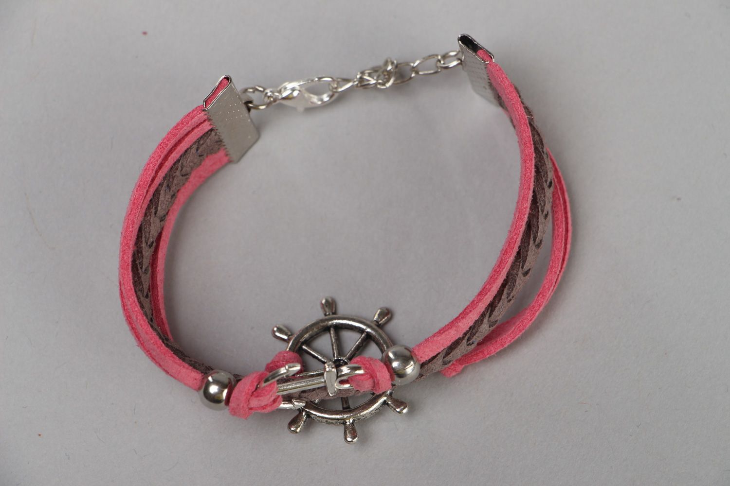 Handmade pink and gray friendship bracelet woven of faux suede with steering wheel photo 2