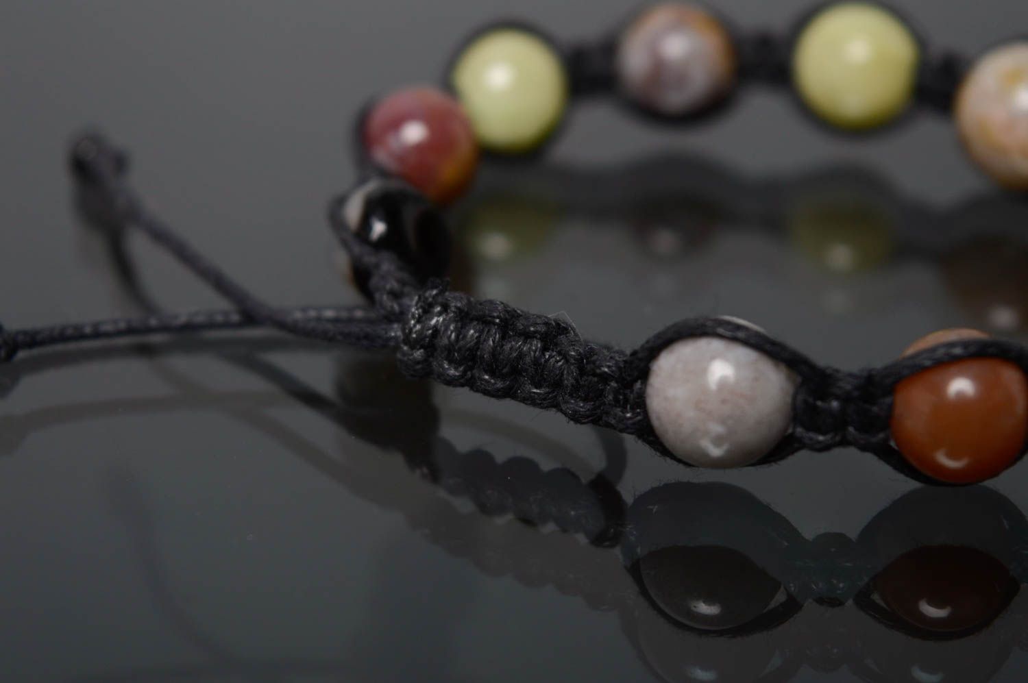 Woven bracelet with natural stones photo 4