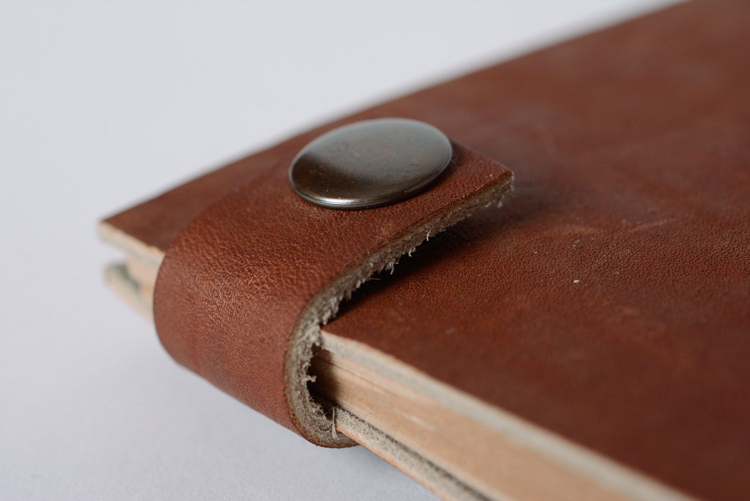 Handmade brown genuine leather notebook with kraft paper and buttons photo 2