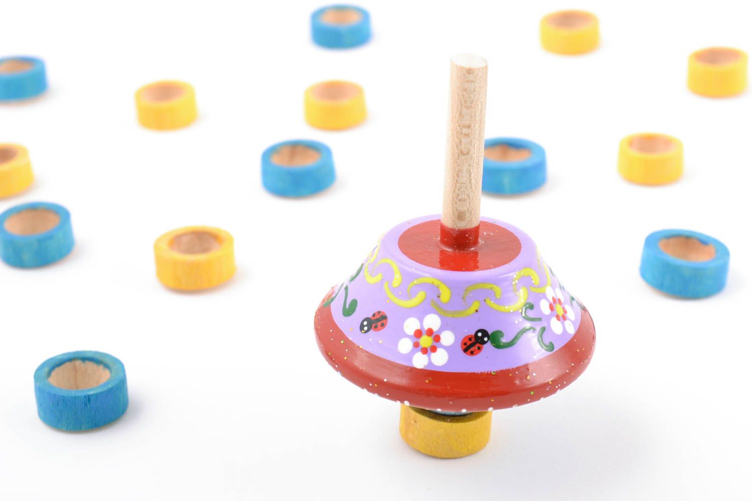 Bright painted homemade wooden eco toy spinning top for children photo 1
