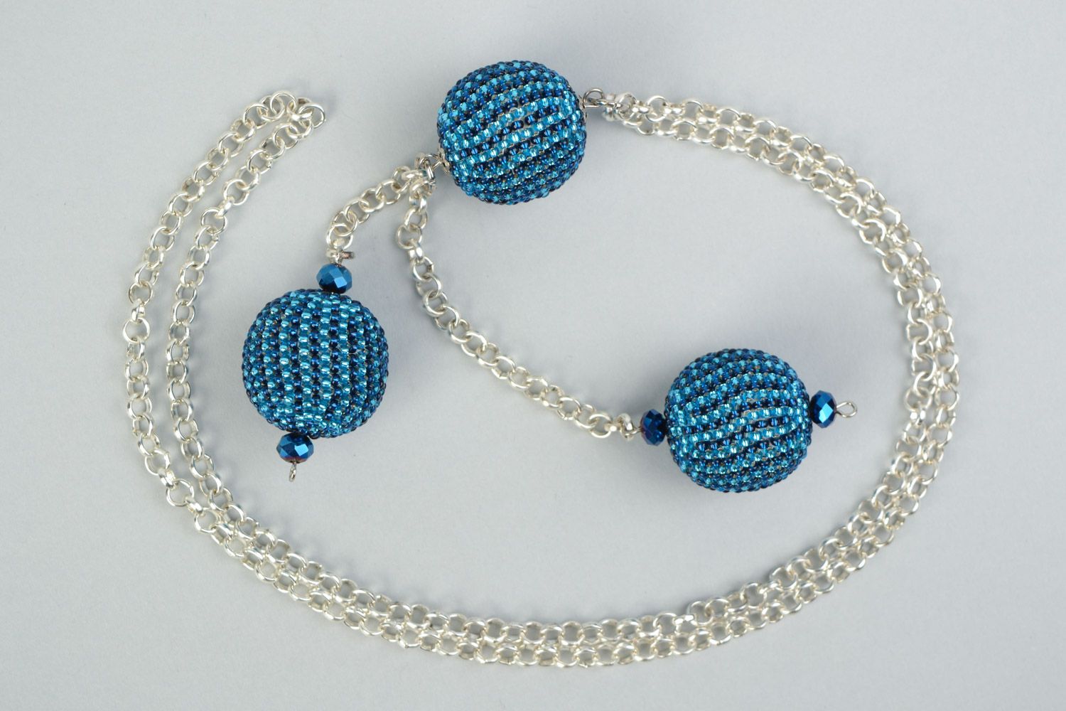 Laconic handmade pendant with blue beaded balls on long metal chain for women photo 4