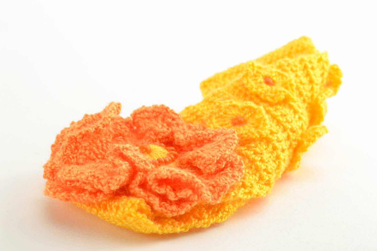 Bandeau à cheveux tricoté accessoire fait main orange avec fleur pour enfant photo 2