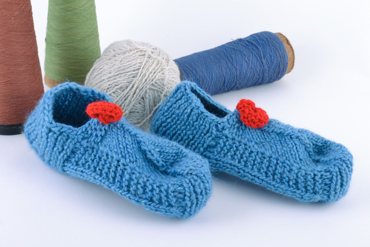 Handmade warm knitted half-woolen women's slippers of blue color with red knitted accessories photo 1