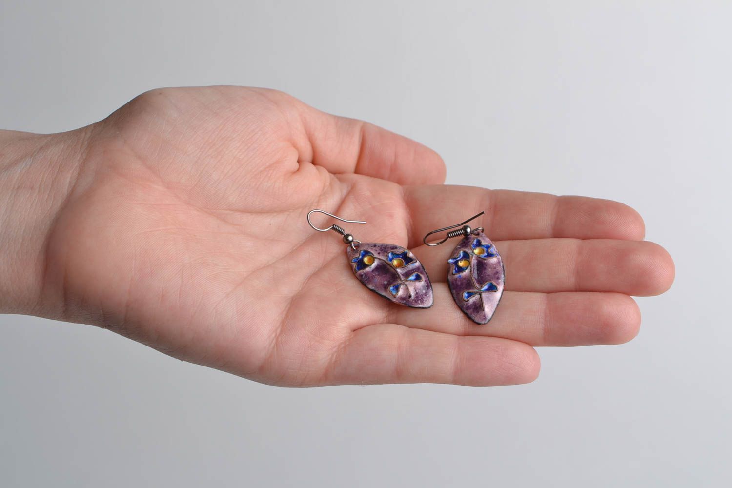 Handmade enameled copper dangling earrings with flower in blue and violet colors photo 2