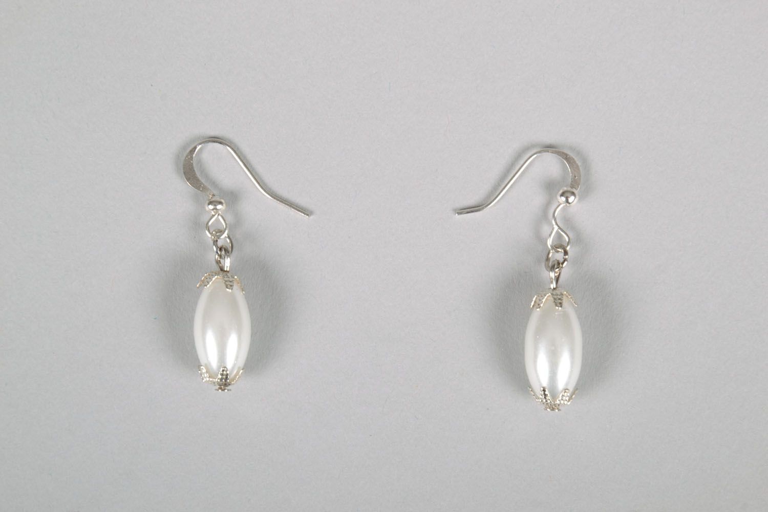 White beaded earrings photo 2