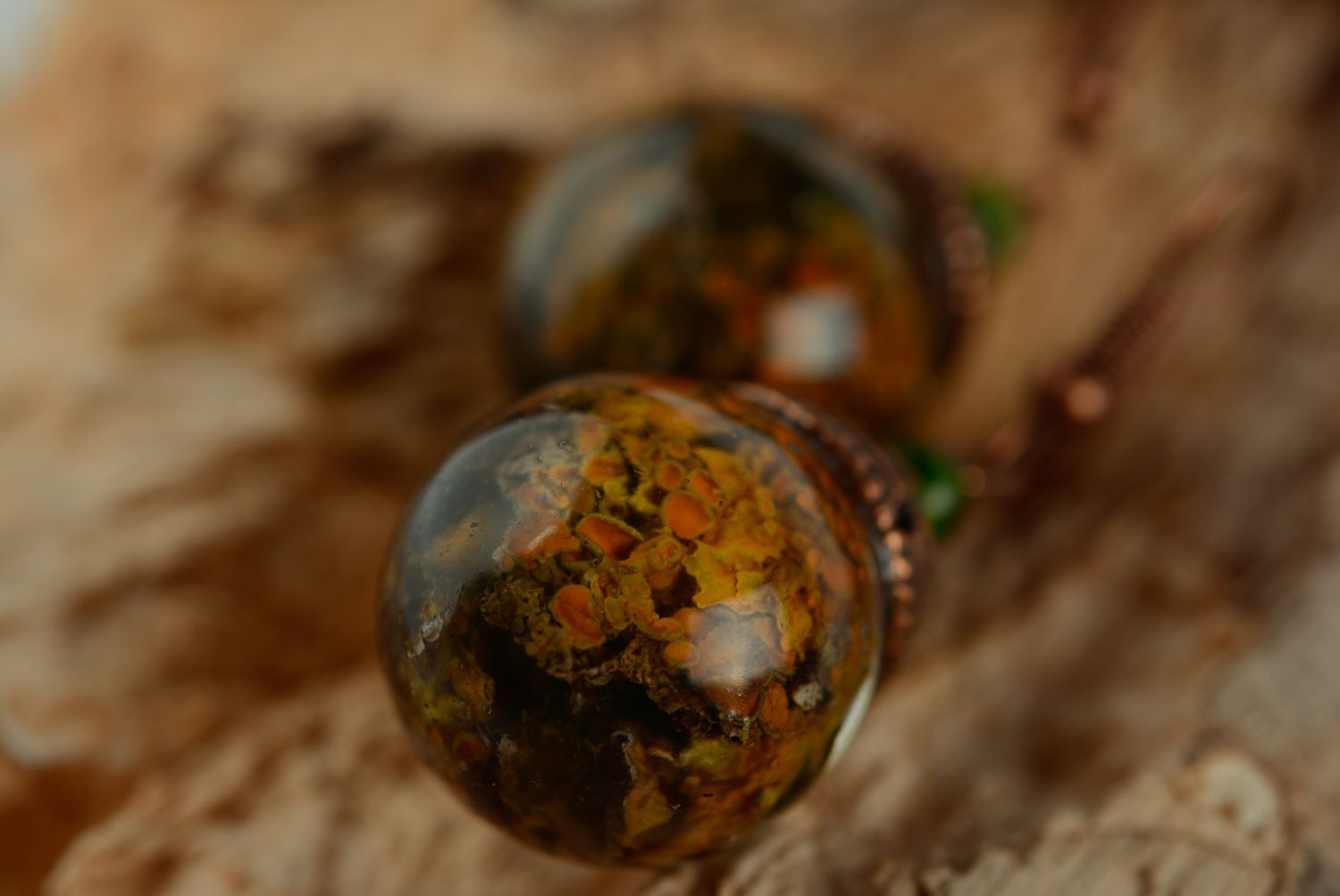 Handmade ball earrings with lichen plant coated with epoxy resin photo 4