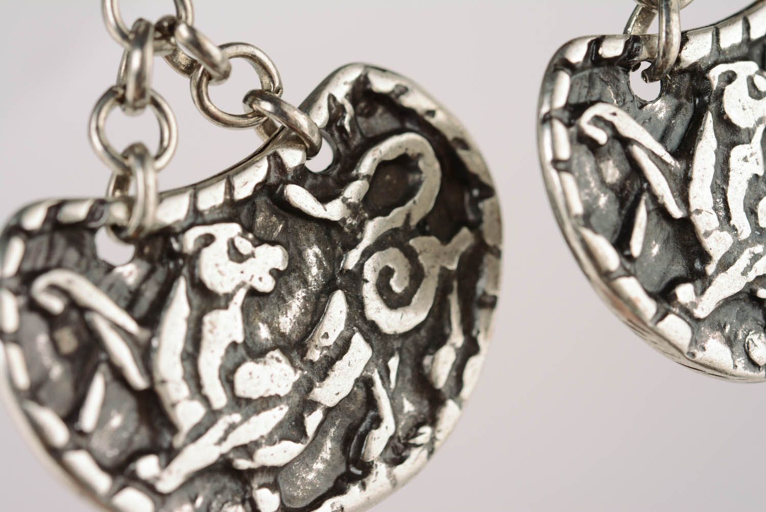 Massive Ohrringe aus Metall Schneeleopard foto 2